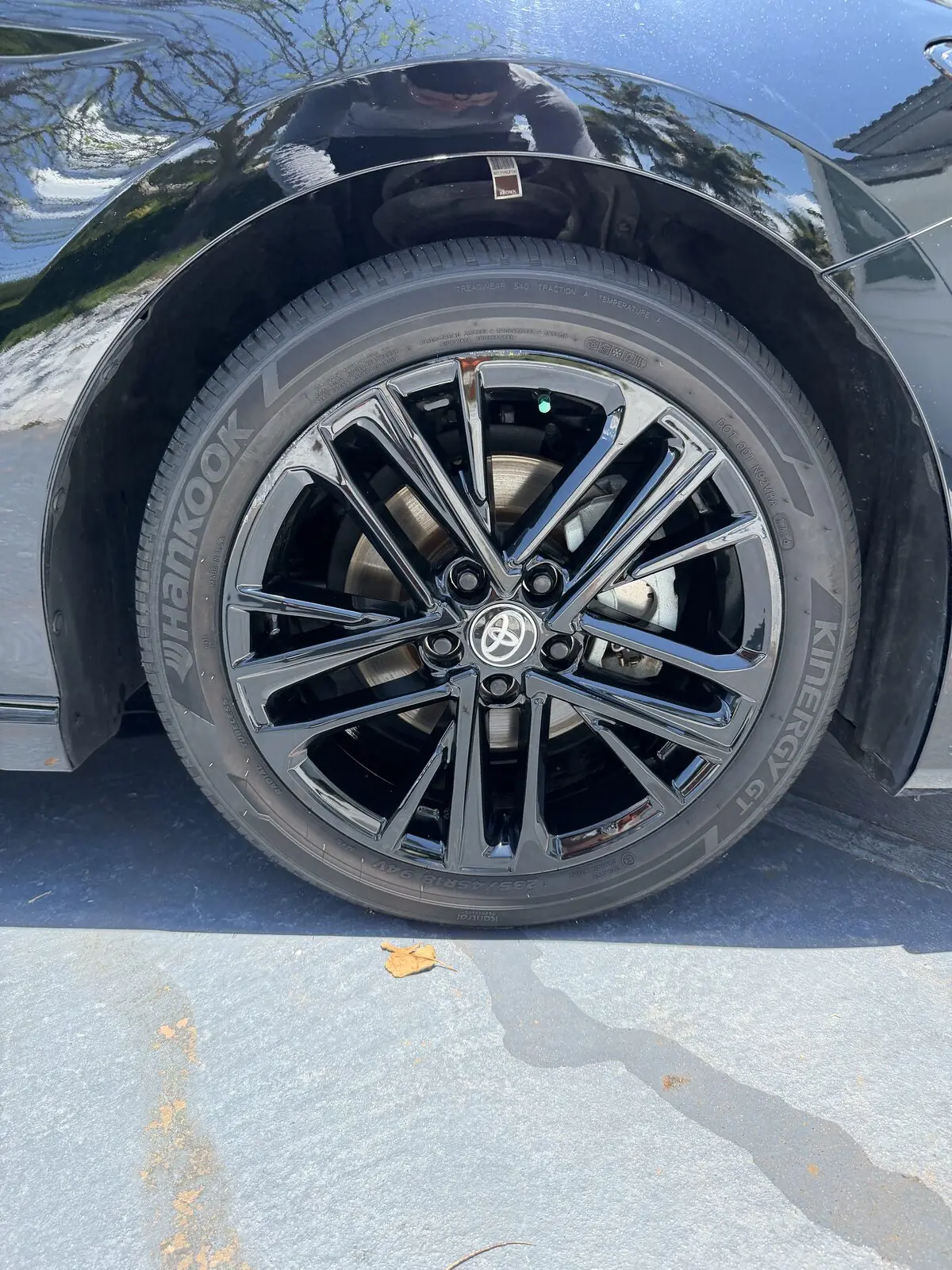 Black Toyota Camry wheel detail — after